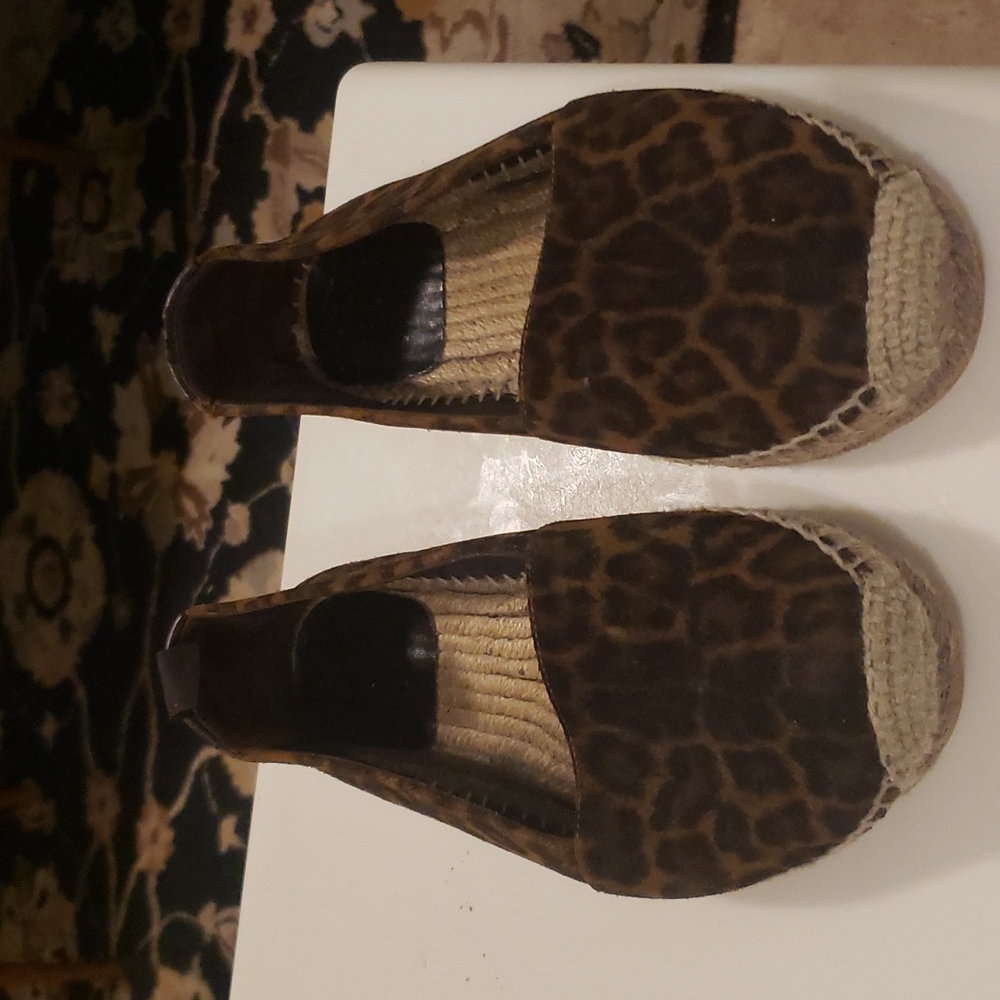 Yves Saint Laurent leopard loafers.